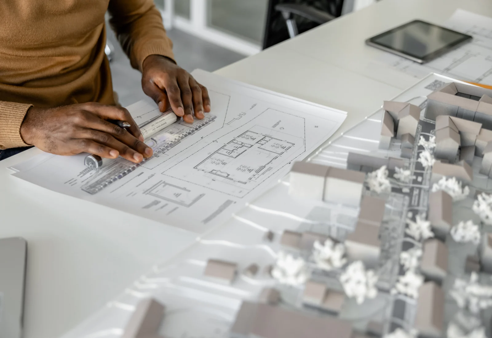 Development advisor reviewing site plans